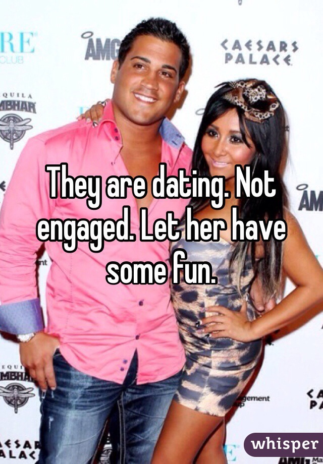 They are dating. Not engaged. Let her have some fun. 