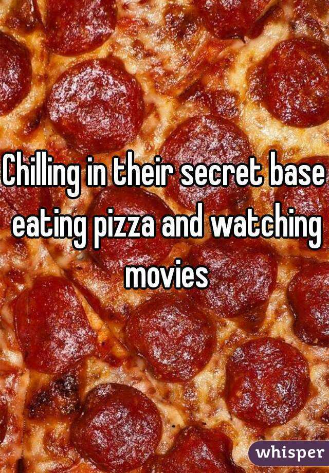 Chilling in their secret base eating pizza and watching movies