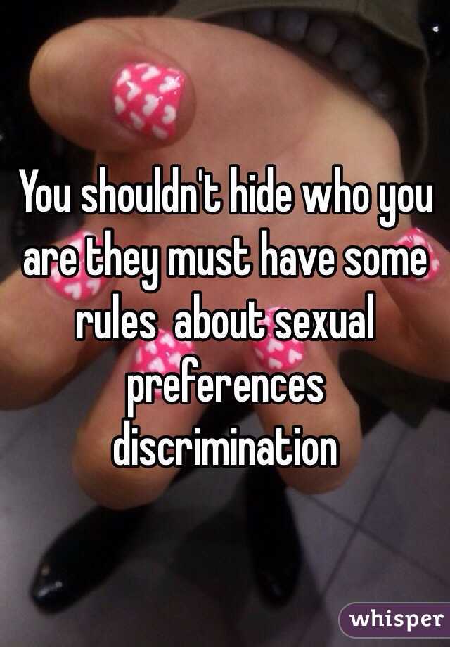 You shouldn't hide who you are they must have some rules  about sexual preferences discrimination