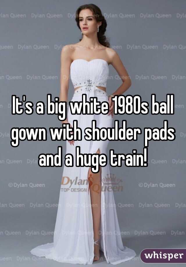 It's a big white 1980s ball gown with shoulder pads and a huge train! 