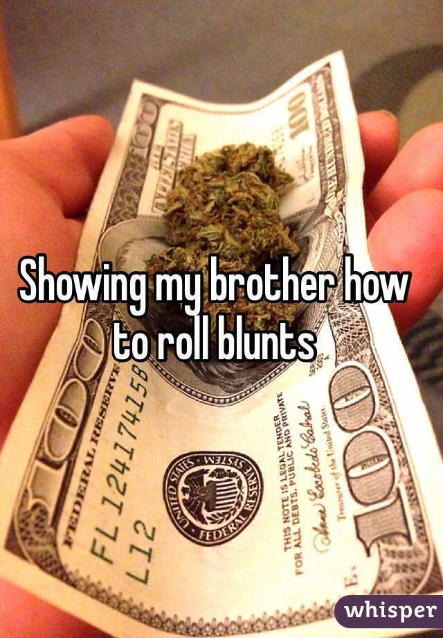Showing my brother how to roll blunts 