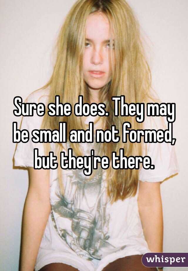 Sure she does. They may be small and not formed, but they're there.