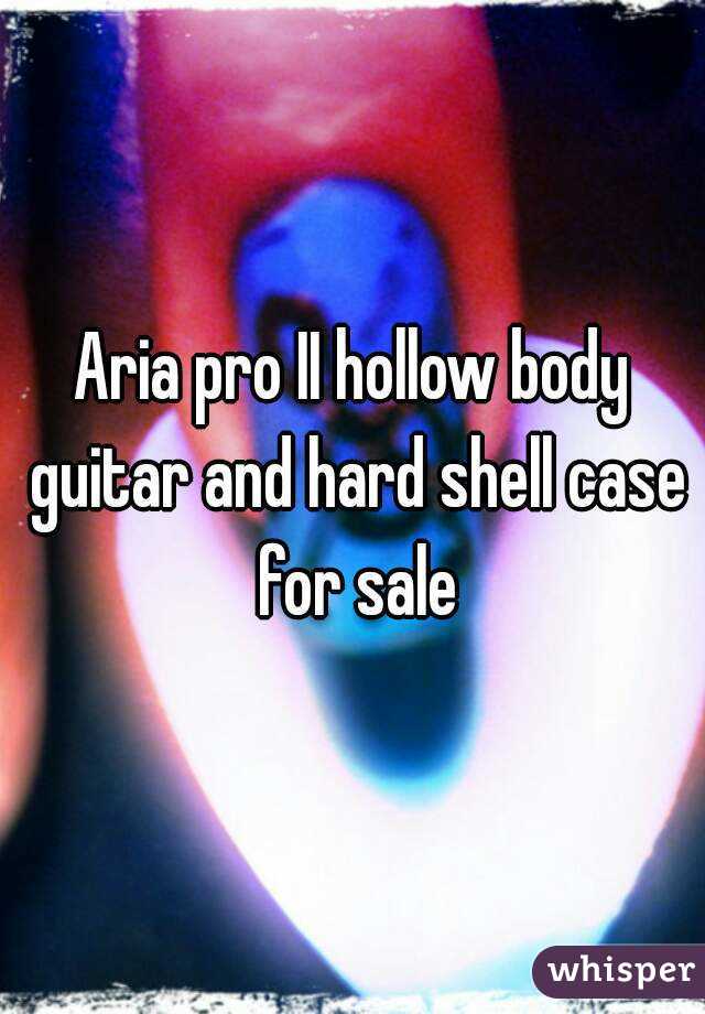 Aria pro II hollow body guitar and hard shell case for sale