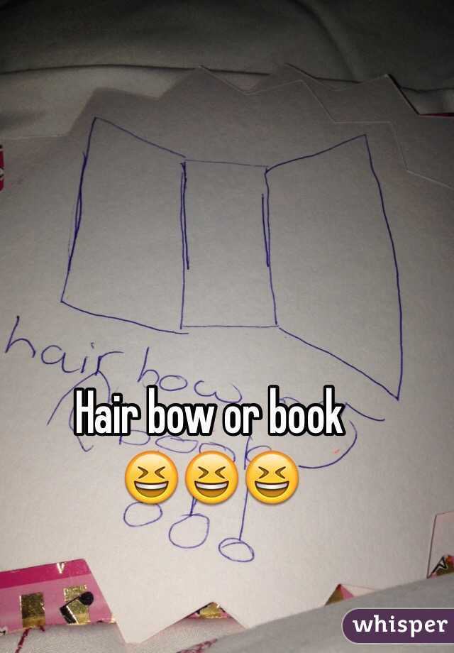 Hair bow or book 
😆😆😆