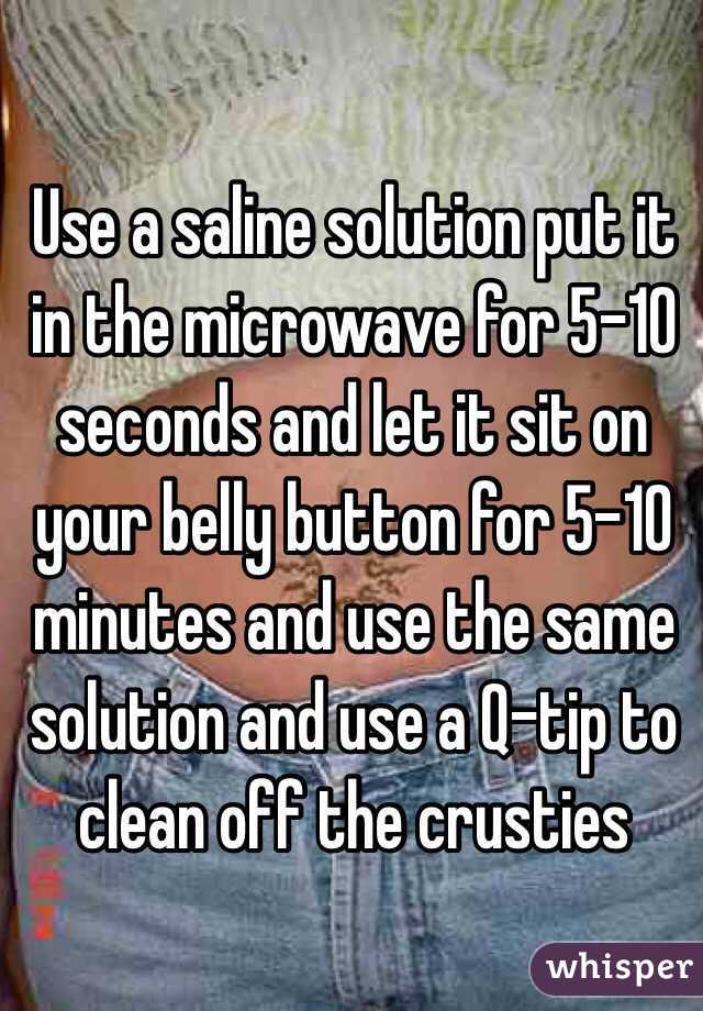 Use a saline solution put it in the microwave for 5-10 seconds and let it sit on your belly button for 5-10 minutes and use the same solution and use a Q-tip to clean off the crusties 