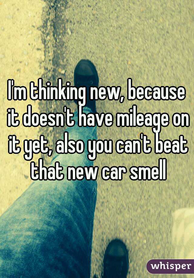 I'm thinking new, because it doesn't have mileage on it yet, also you can't beat that new car smell