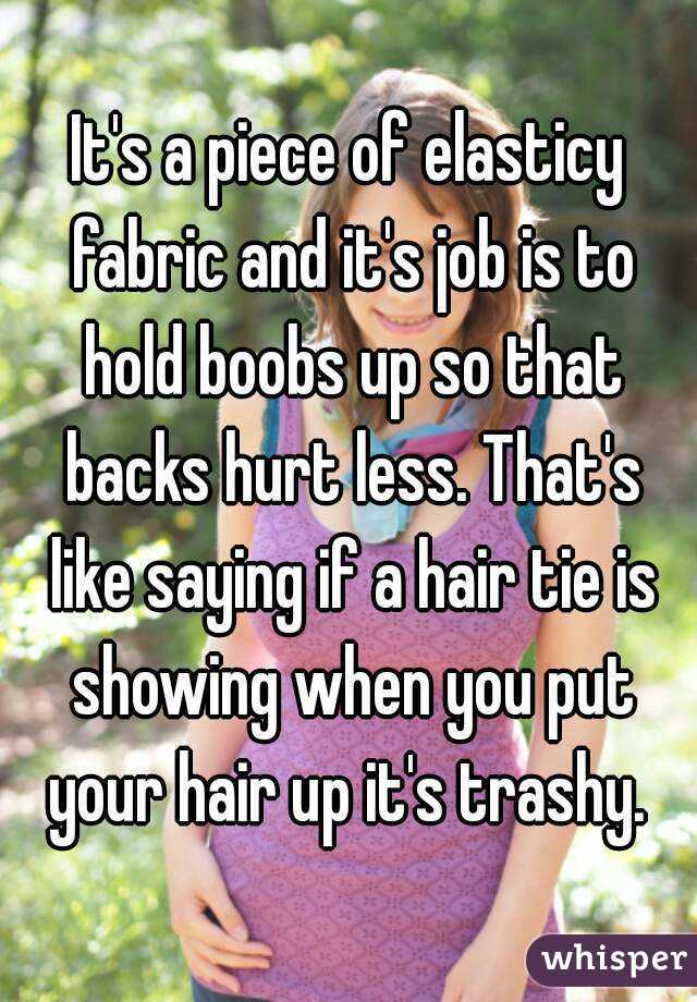 It's a piece of elasticy fabric and it's job is to hold boobs up so that backs hurt less. That's like saying if a hair tie is showing when you put your hair up it's trashy. 