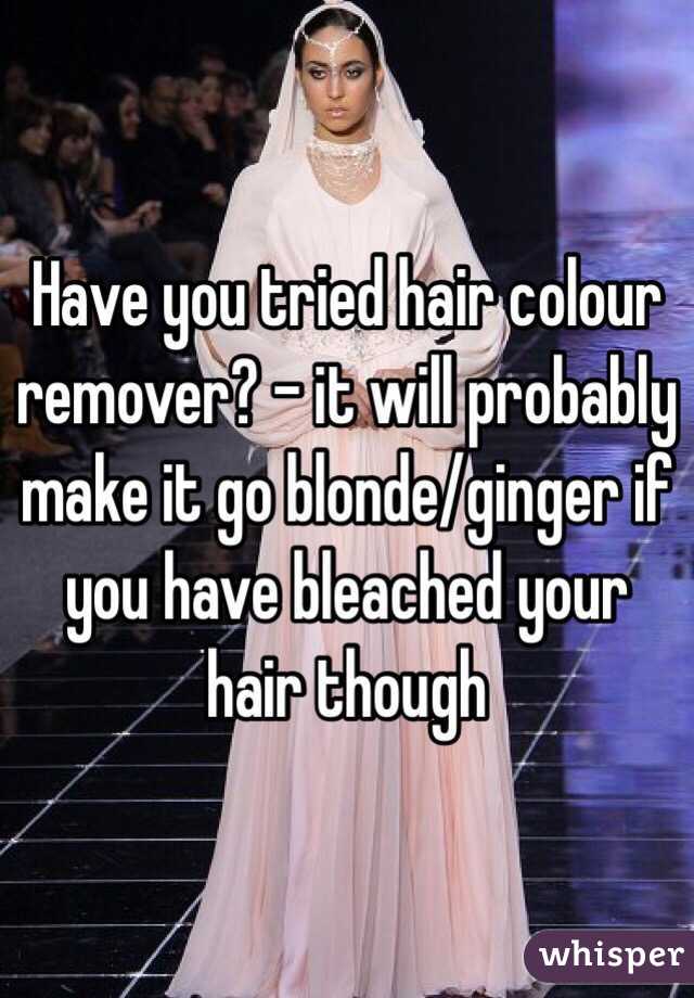 Have you tried hair colour remover? - it will probably make it go blonde/ginger if you have bleached your hair though 