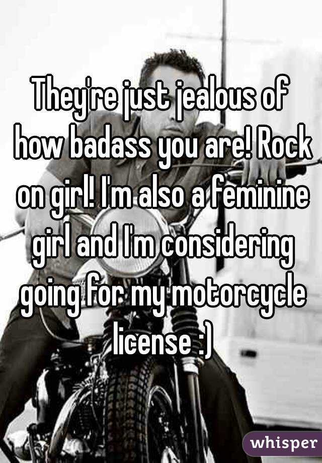 They're just jealous of how badass you are! Rock on girl! I'm also a feminine girl and I'm considering going for my motorcycle license :)