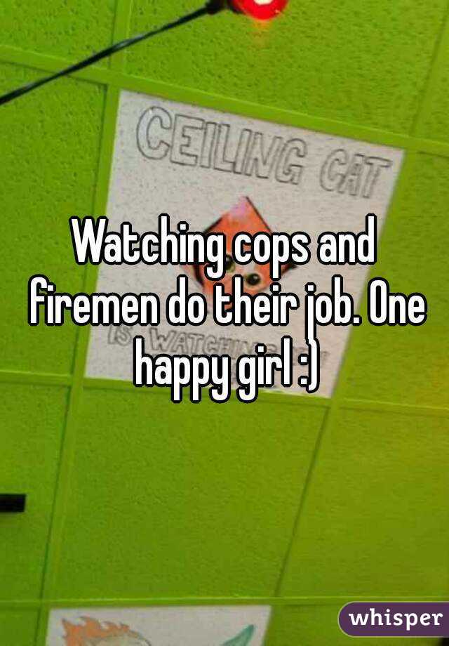 Watching cops and firemen do their job. One happy girl :)