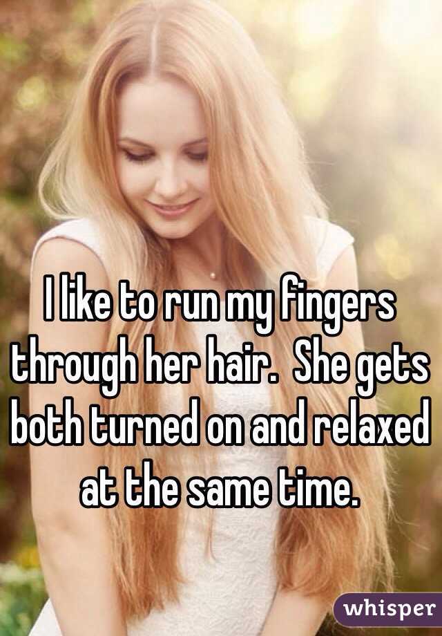 I like to run my fingers through her hair.  She gets both turned on and relaxed at the same time.