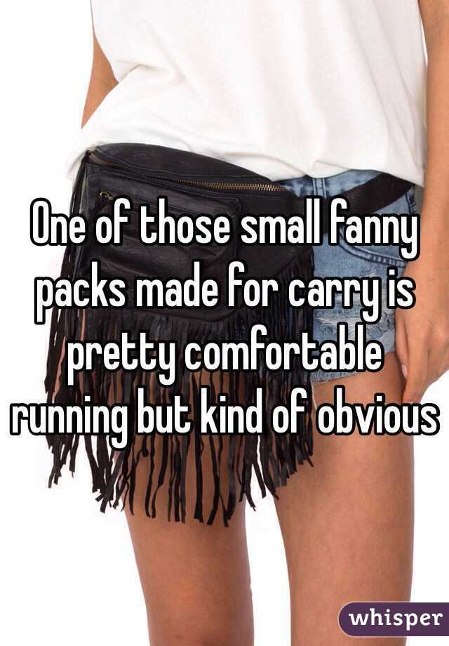 One of those small fanny packs made for carry is pretty comfortable running but kind of obvious