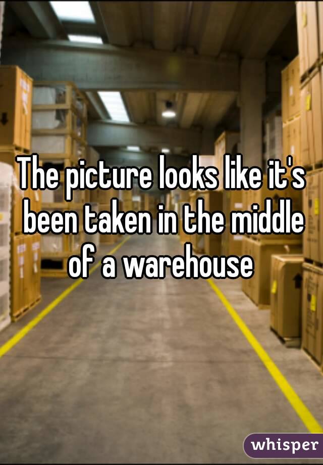 The picture looks like it's been taken in the middle of a warehouse 