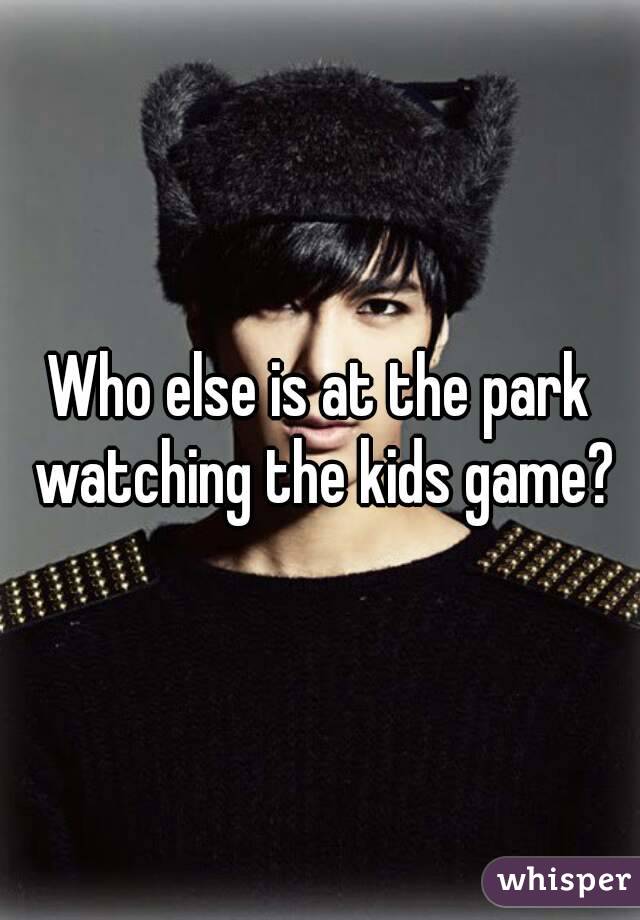 Who else is at the park watching the kids game?
