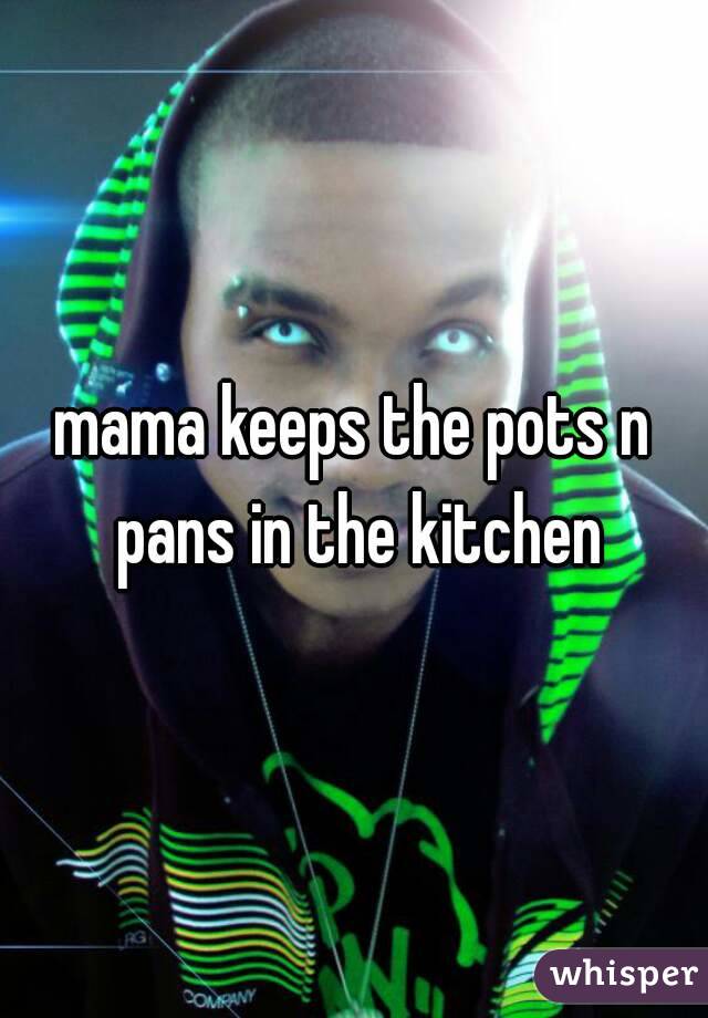 mama keeps the pots n pans in the kitchen