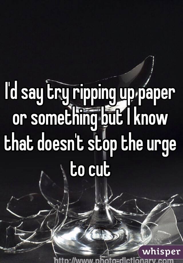I'd say try ripping up paper or something but I know that doesn't stop the urge to cut 