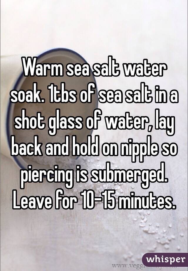 Warm sea salt water soak. 1tbs of sea salt in a shot glass of water, lay back and hold on nipple so piercing is submerged. Leave for 10-15 minutes. 