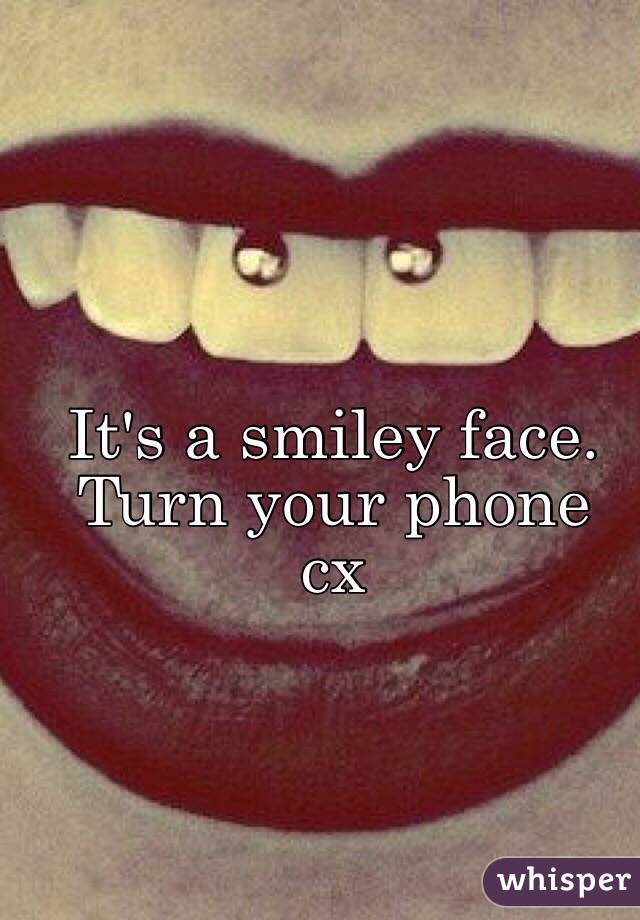 It's a smiley face. Turn your phone 
cx