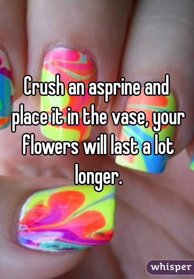 Crush an asprine and place it in the vase, your flowers will last a lot longer.
