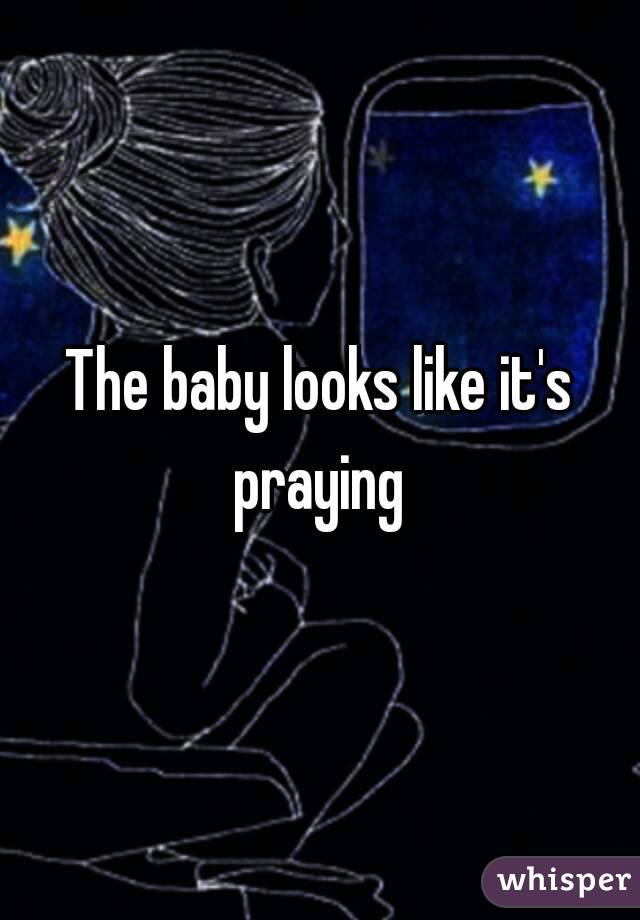 The baby looks like it's praying 