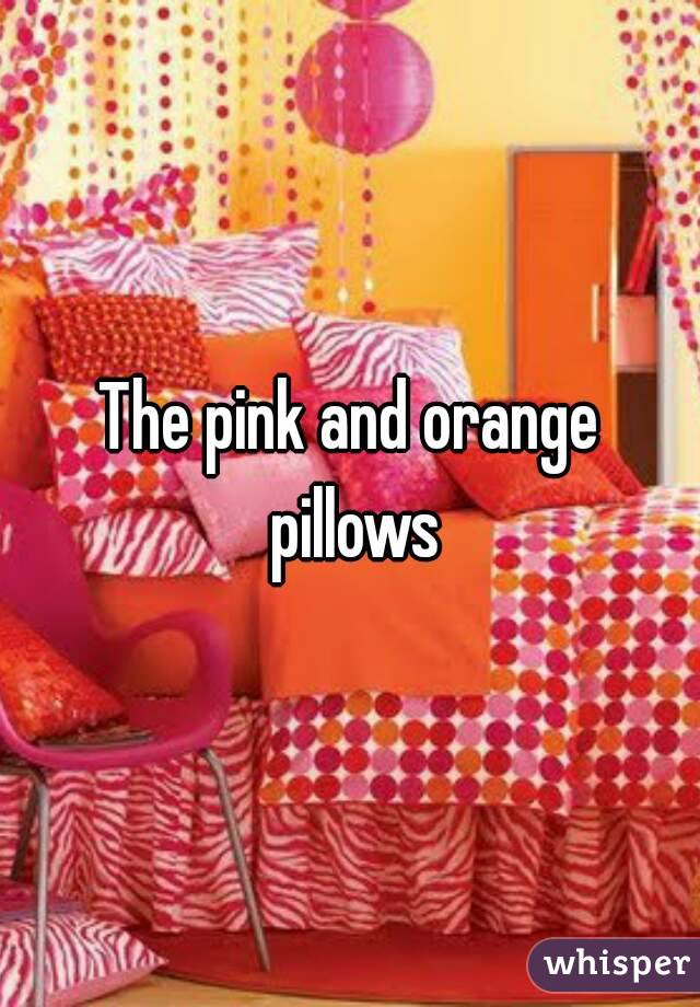 The pink and orange pillows