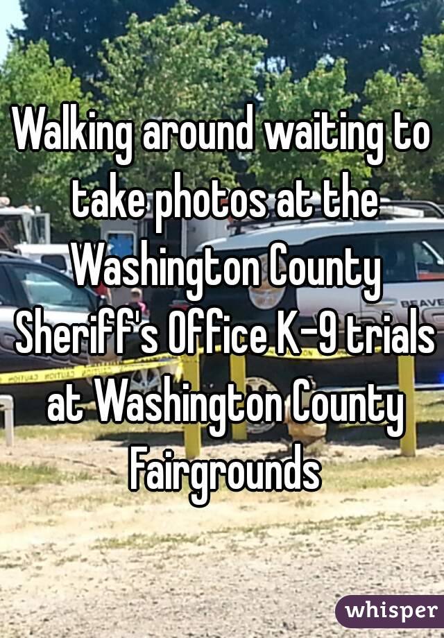 Walking around waiting to take photos at the Washington County Sheriff's Office K-9 trials at Washington County Fairgrounds