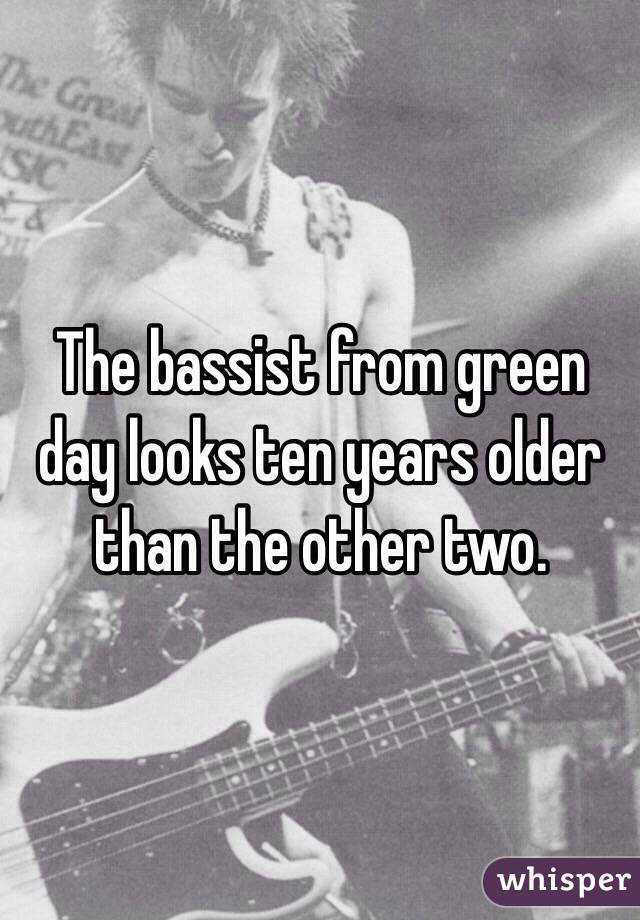 The bassist from green day looks ten years older than the other two.