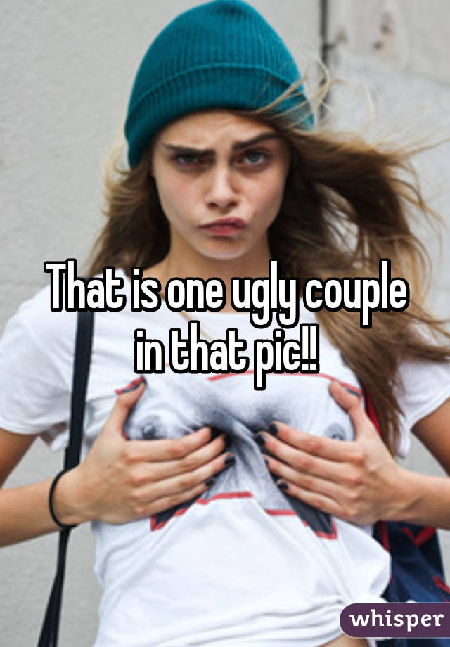 That is one ugly couple in that pic!!