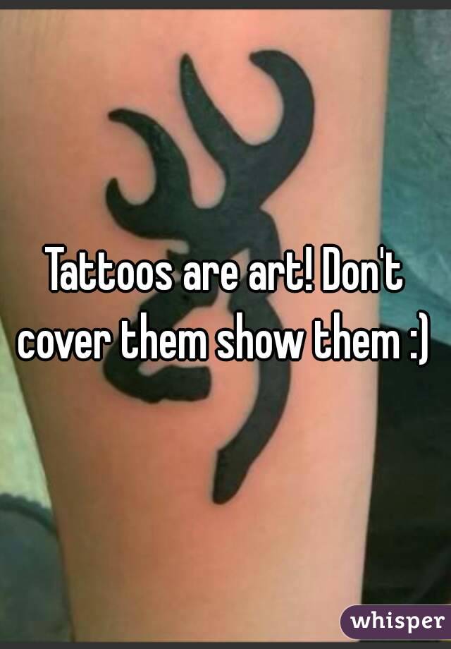 Tattoos are art! Don't cover them show them :) 