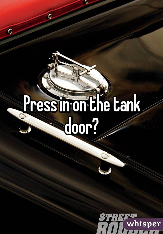 Press in on the tank door?