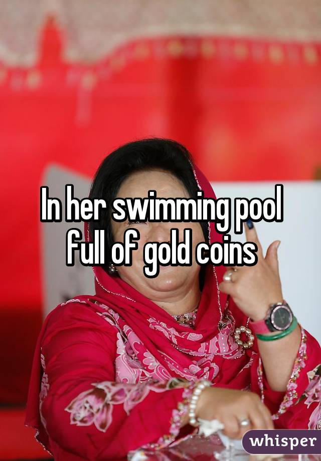 In her swimming pool full of gold coins