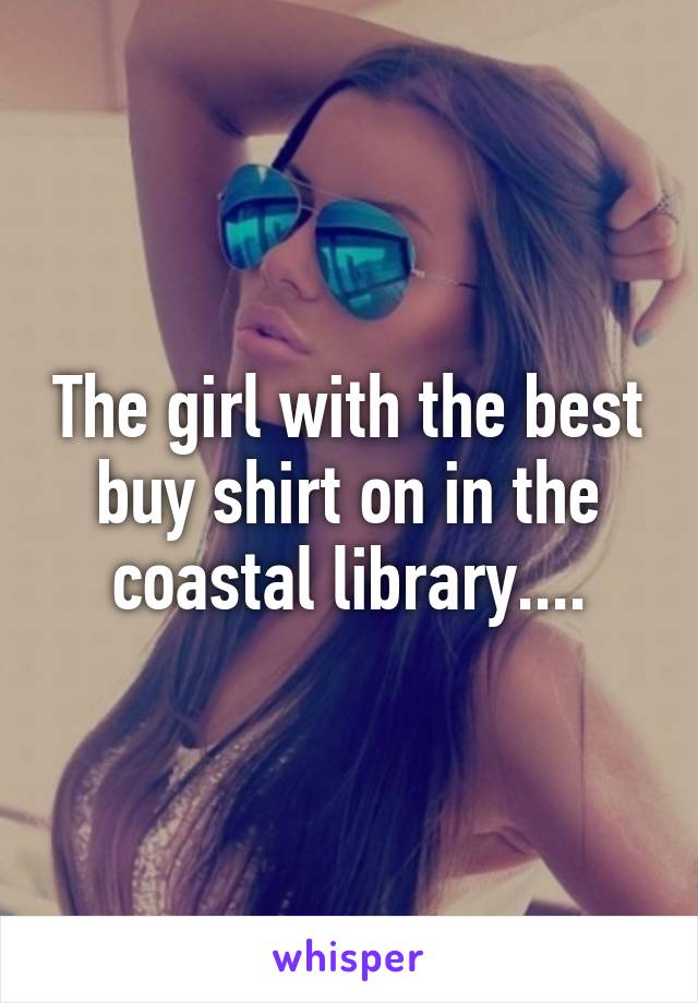 The girl with the best buy shirt on in the coastal library....