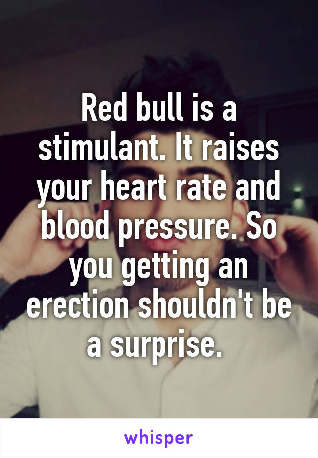 Red bull is a stimulant. It raises your heart rate and blood pressure. So you getting an erection shouldn't be a surprise. 