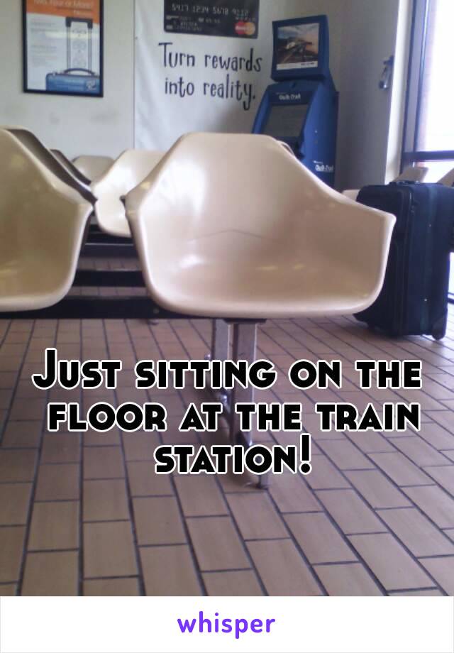 Just sitting on the floor at the train station!