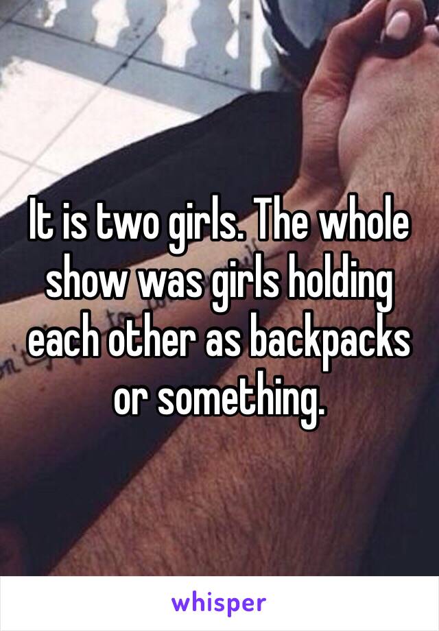 It is two girls. The whole show was girls holding each other as backpacks or something.