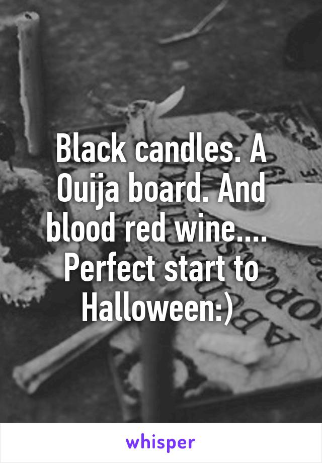 Black candles. A Ouija board. And blood red wine.... 
Perfect start to Halloween:) 