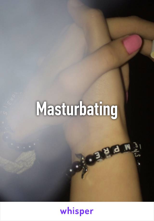 Masturbating