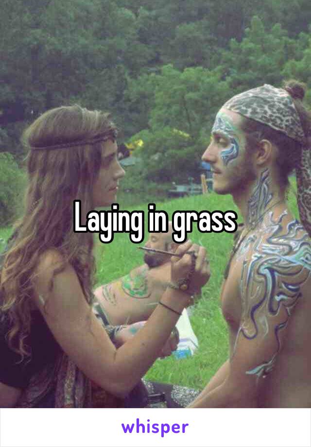 Laying in grass