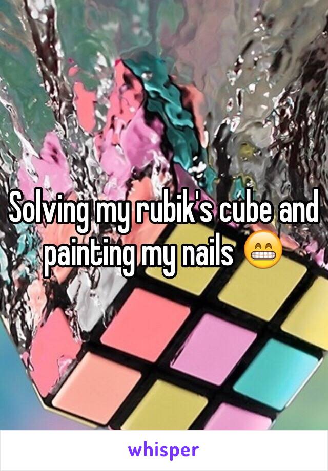 Solving my rubik's cube and painting my nails 😁