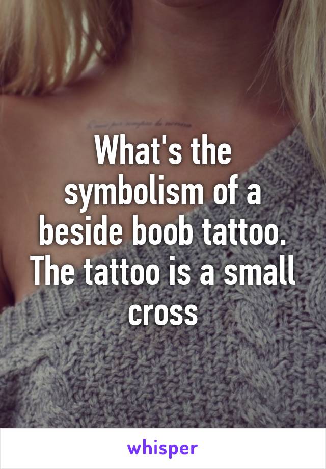 What's the symbolism of a beside boob tattoo. The tattoo is a small cross