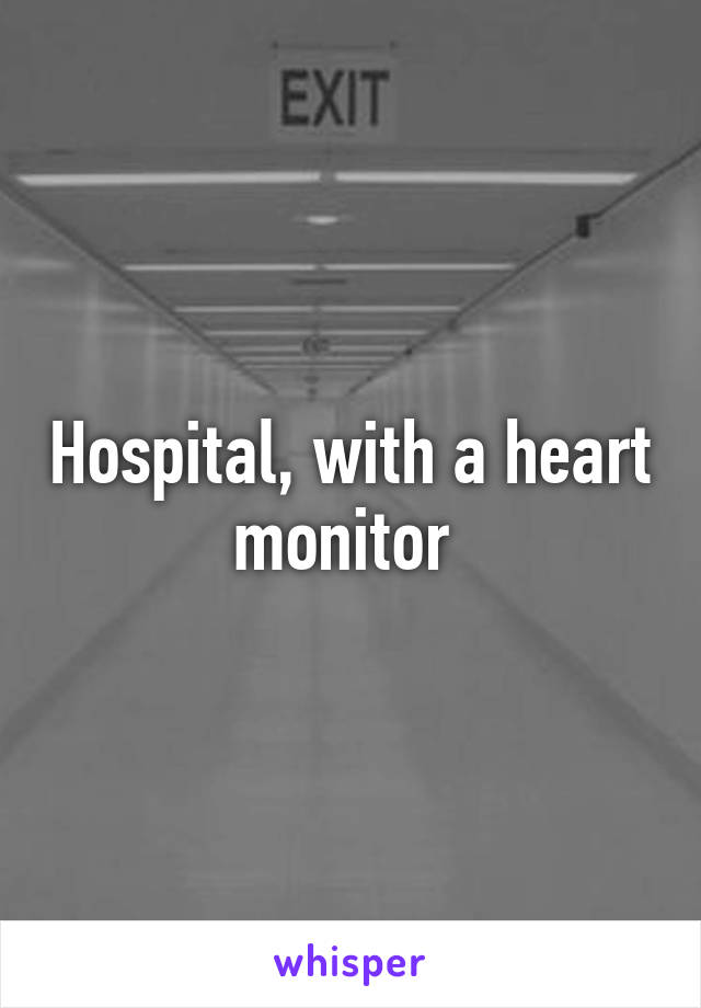 Hospital, with a heart monitor 