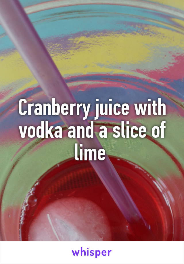 Cranberry juice with vodka and a slice of lime 