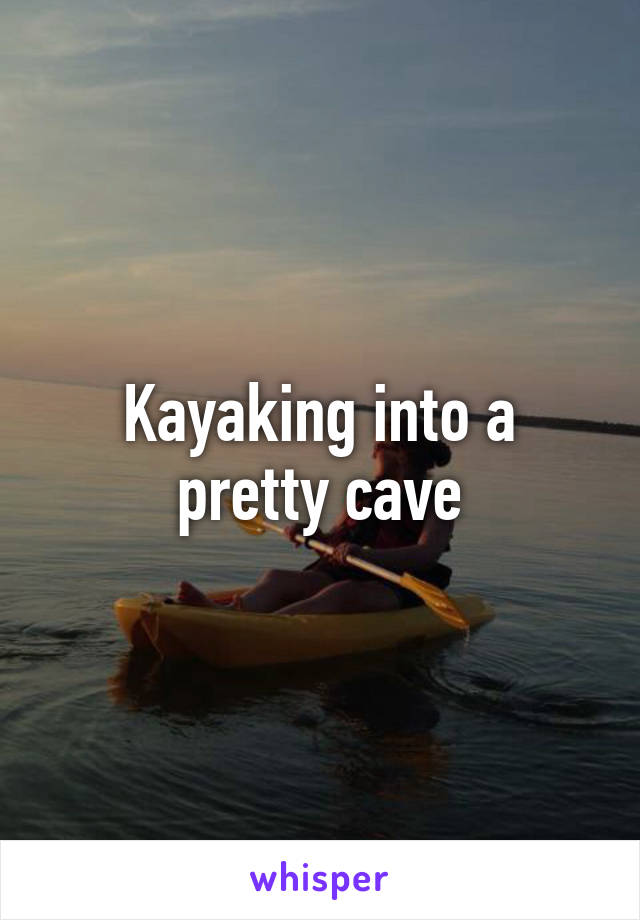 Kayaking into a pretty cave