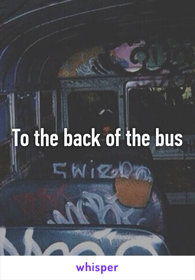 To the back of the bus
