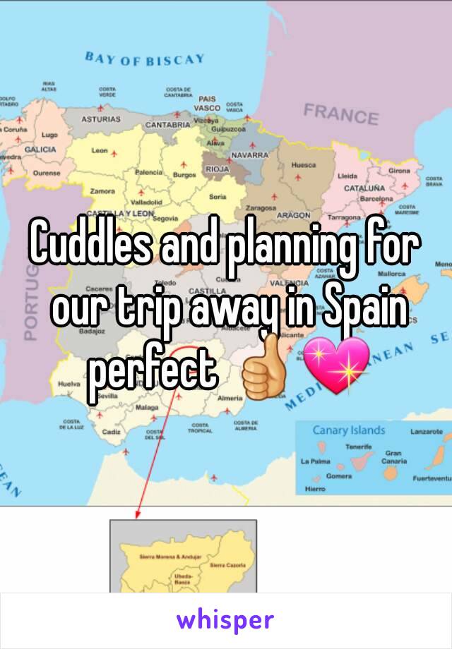 Cuddles and planning for our trip away in Spain perfect 👍💖