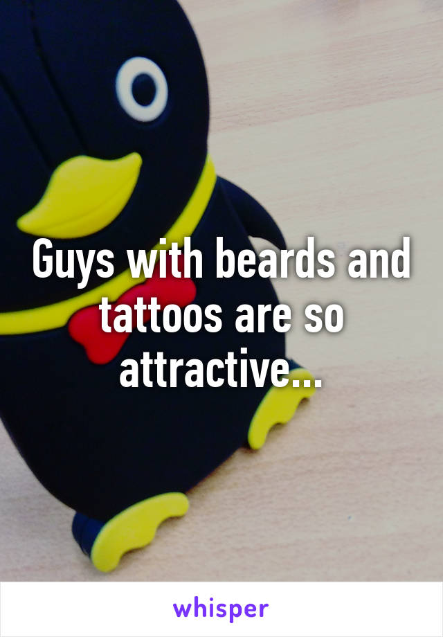 Guys with beards and tattoos are so attractive...