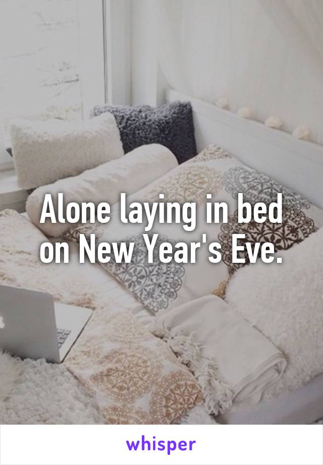 Alone laying in bed on New Year's Eve.