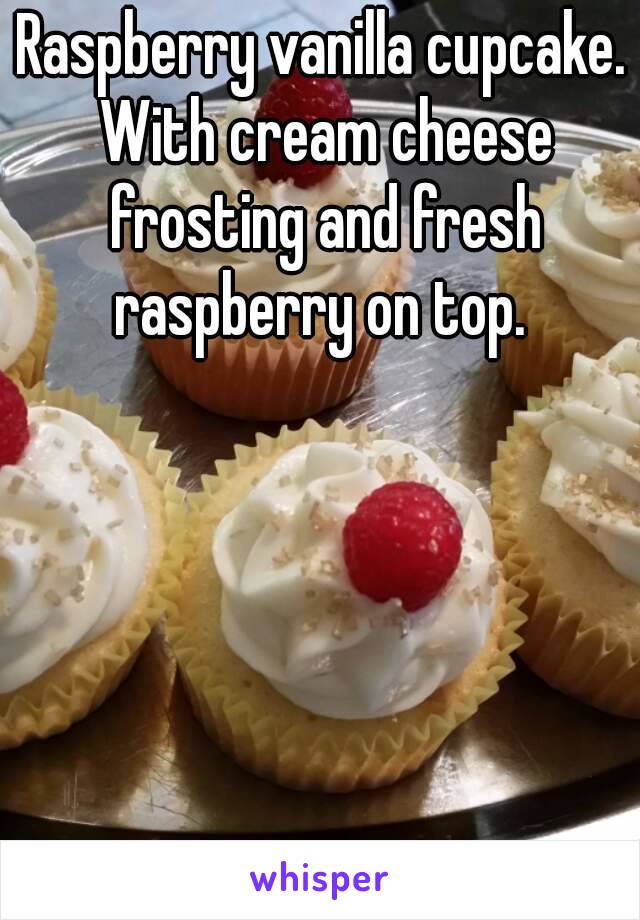 Raspberry vanilla cupcake. With cream cheese frosting and fresh raspberry on top. 