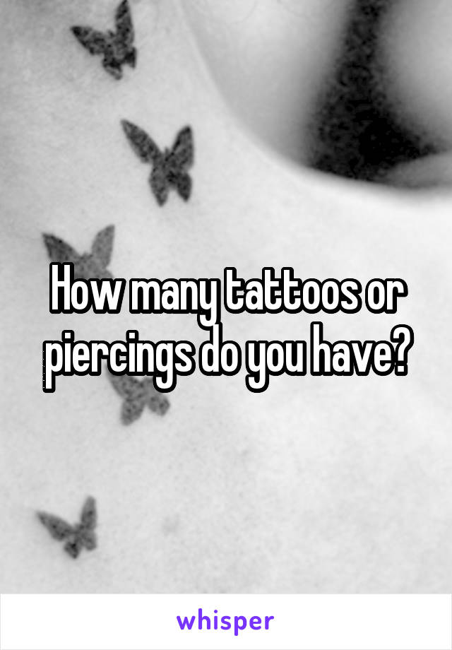 How many tattoos or piercings do you have?