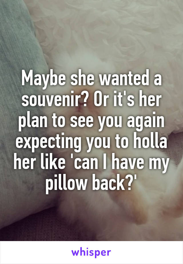 Maybe she wanted a souvenir? Or it's her plan to see you again expecting you to holla her like 'can I have my pillow back?'